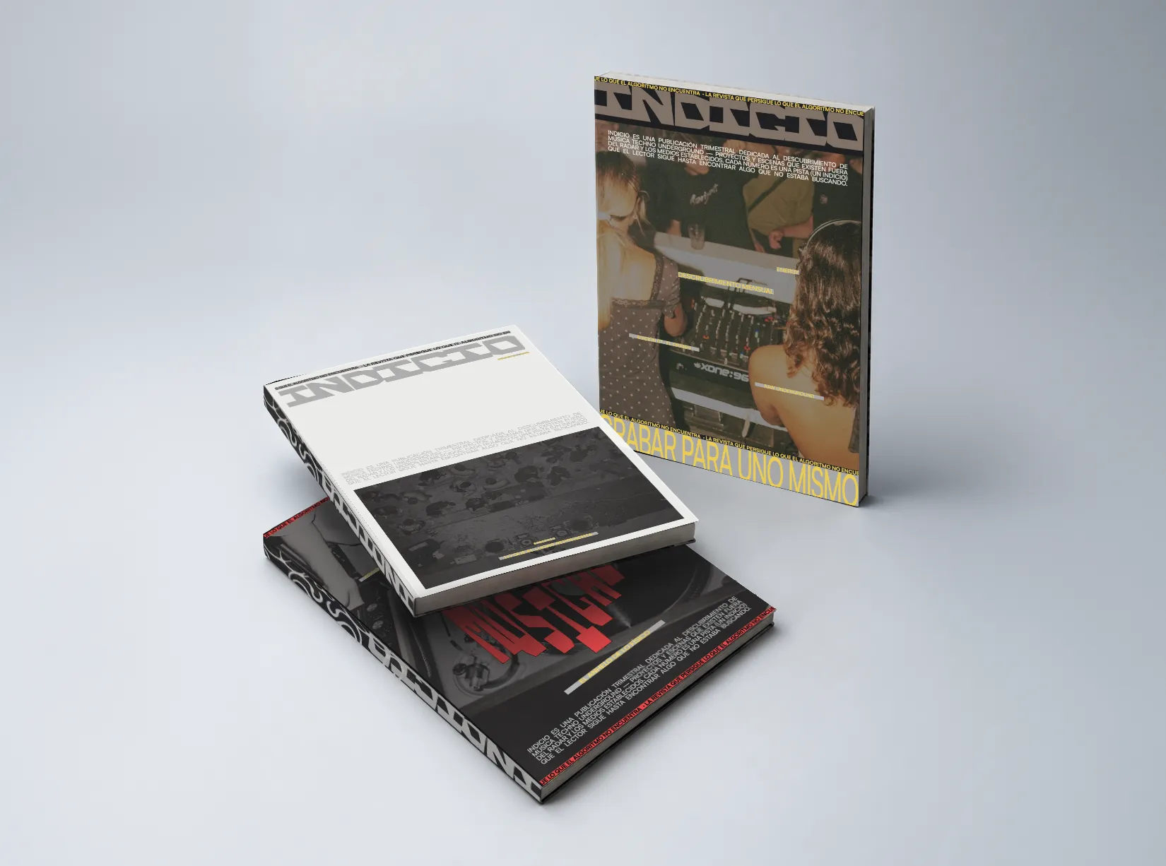 Indicio magazine cover with a bold ghosted wordmark on a yellow background